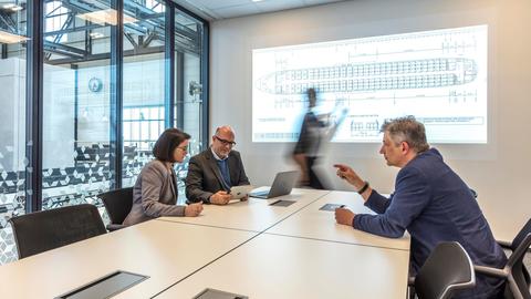 Airbus people and customers in meeting room