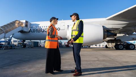 People talking in front of A350 People talking in front of A350