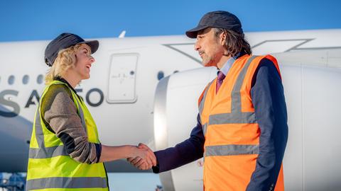 Two people shaking hands