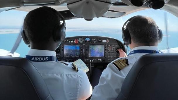 Airbus Flight Academy cadet with instructor in aircraft