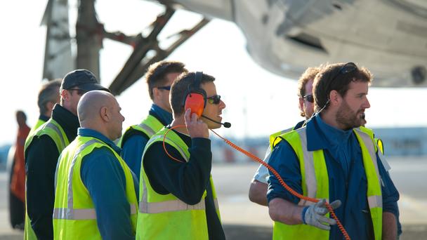 Maintenance workers on ground Maintenance workers on ground