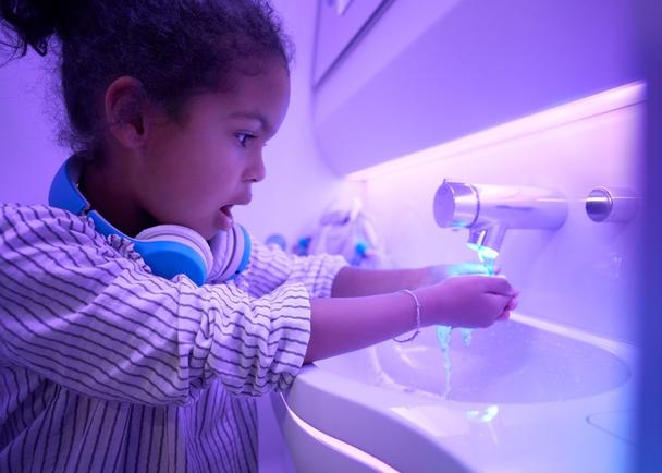 Touchless features used by child in A330neo Airspace cabin © AIRBUS 2020 - photo byDominik Mentzos / Taylor James Touchless features used by child in A330neo Airspace cabin