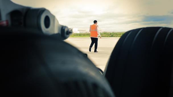 People on tarmac People on tarmac