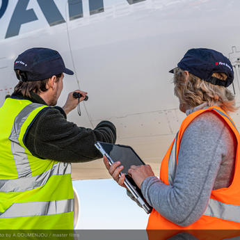 Two people working in front of A350