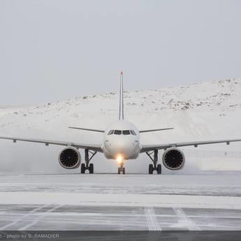 An Airbus aircraft on a snowy runway