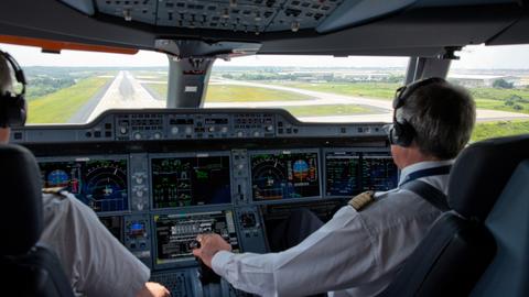 pilots in cockpit