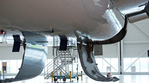 An A330 in a hangar for maintenance and repair