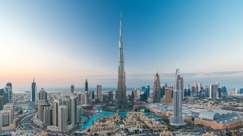 Dubai skyline view from the sky with the Burj Khalifa tower in the center during daytime