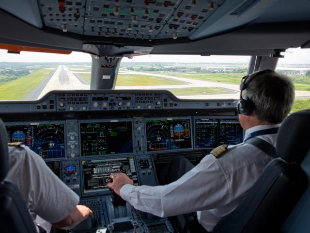 pilots in cockpit