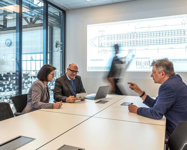Airbus people and customers in meeting room