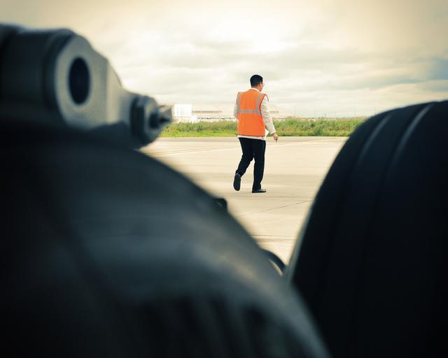 People on tarmac People on tarmac