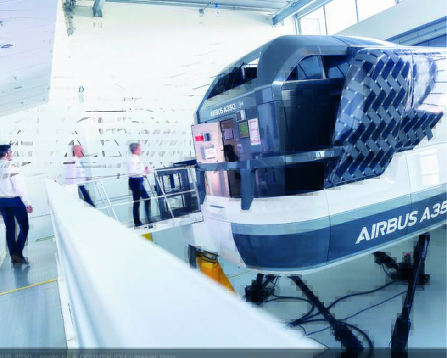 Airbus GO5 Pilot trainees stepping into a full flight simulator as part of their flight training course.