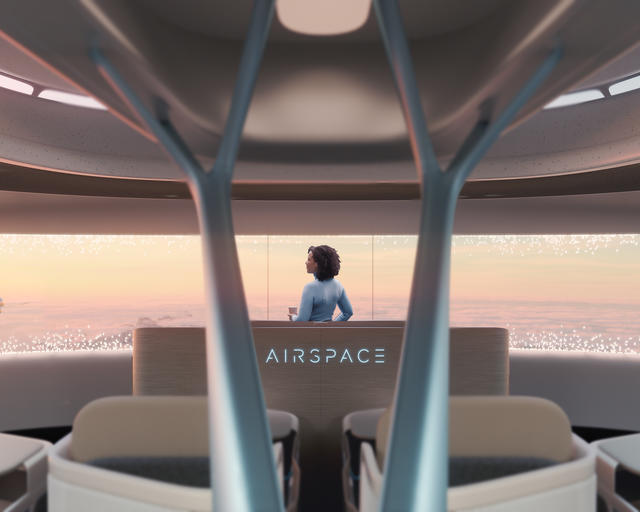 Airspace cabin with lady watching an aircraft flying by