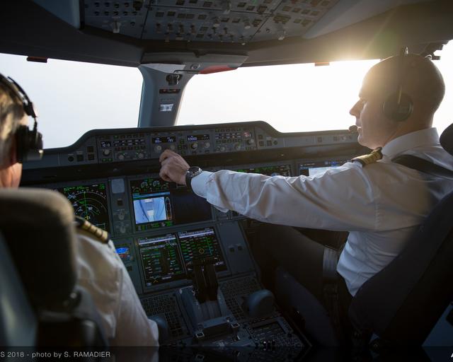 A350-1000 cockpit with pilots A350-1000 cockpit with pilots