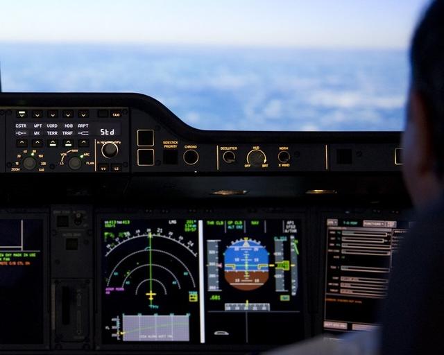 A pilot in a cockpit