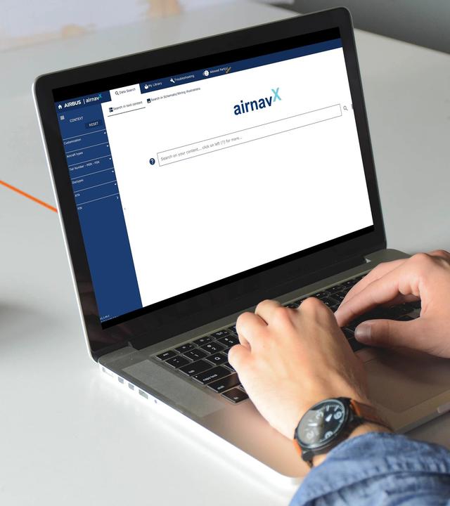 User on their laptop using airnavX