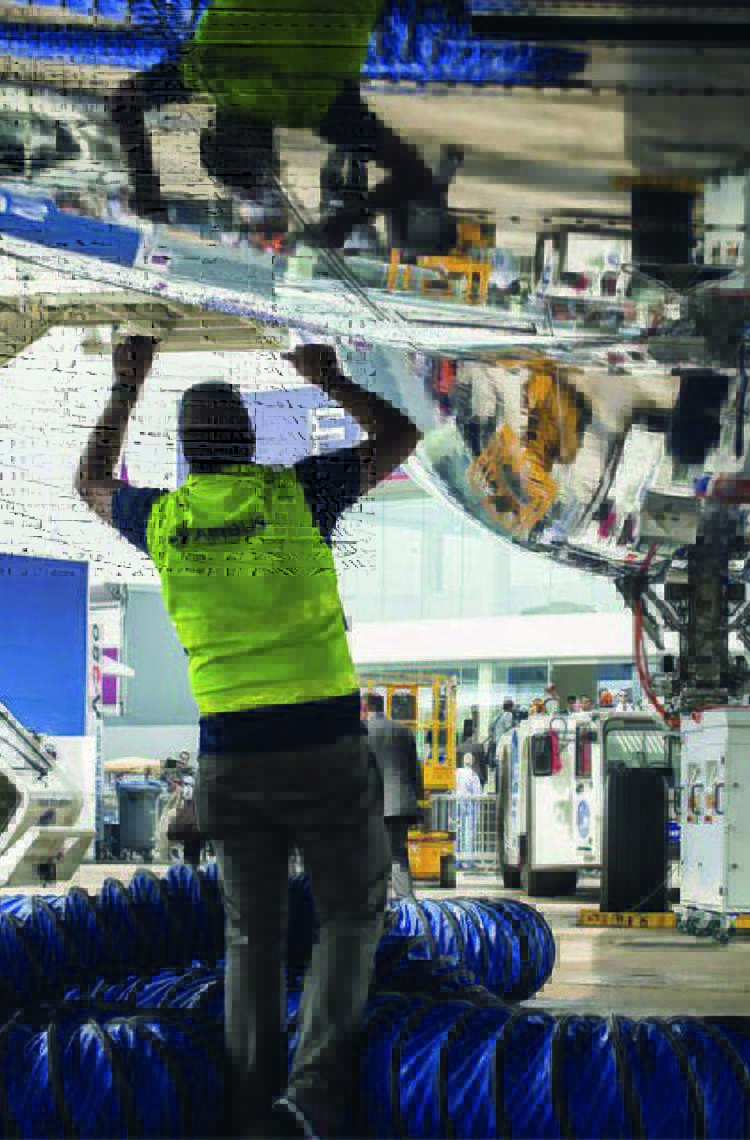 Maintenance technician working on an aircraft to ensure operational safety.