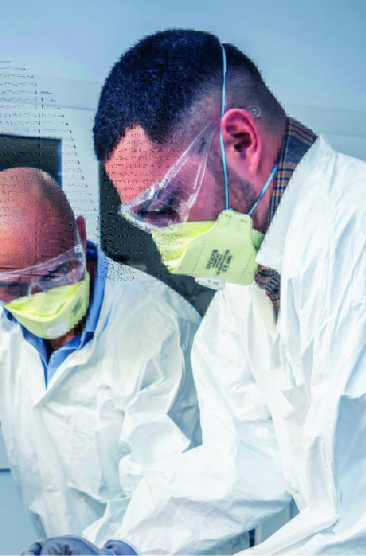Two technicians engaging in structure aircraft training by working on a part of an aircraft frame