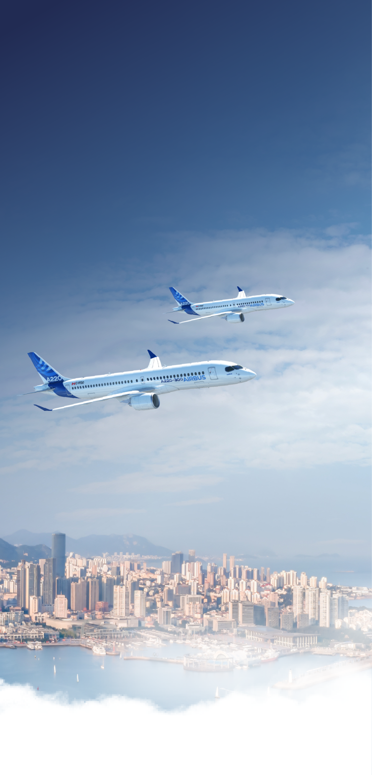 A220 Family A220 Family aircraft soaring above a modern city skyline